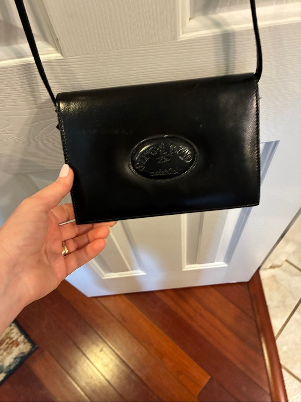 Vintage Black Leather Crossbody Bag with Embossed Logo